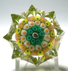 Miniature Strathearn Eight Pointed Star Concentric Millefiori Paperweight with Opaque Lime Green Ground