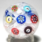 Antique Baccarat Miniature Spaced Concentric Millefiori Paperweight with Four Gridel Canes on a Lace Ground